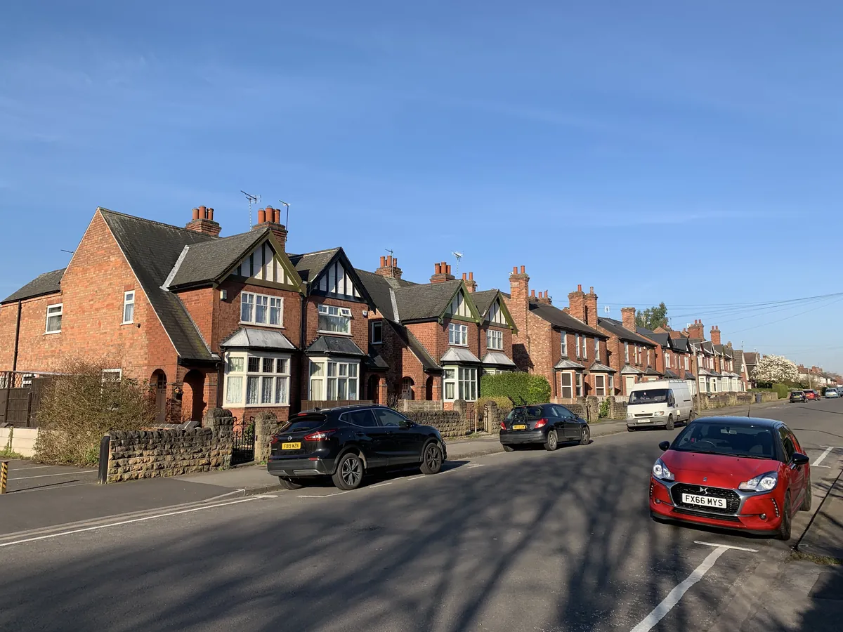 Edwardian semi-detached houses with timbered gables and bay windows on Peveril Road in Beeston