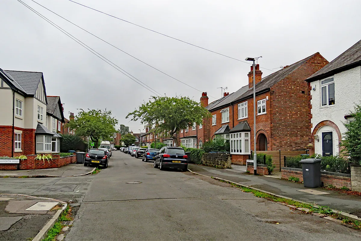 Red-brick semi-detached houses with bay windows on Hampton Road in West Bridgford
